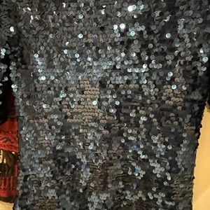 Gorgeous blue sequence dress. Comes to just above the knee on me (I’m 5’1”).